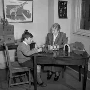 Dr Irene Sabine examining a child at the child guidance clinic, Sydney, 1948. National Archives of Australia, A1200, L11115.
